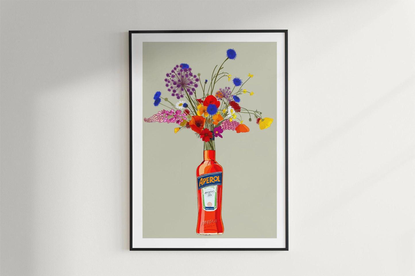 Aperol Bottle with Colourful Wildflowers