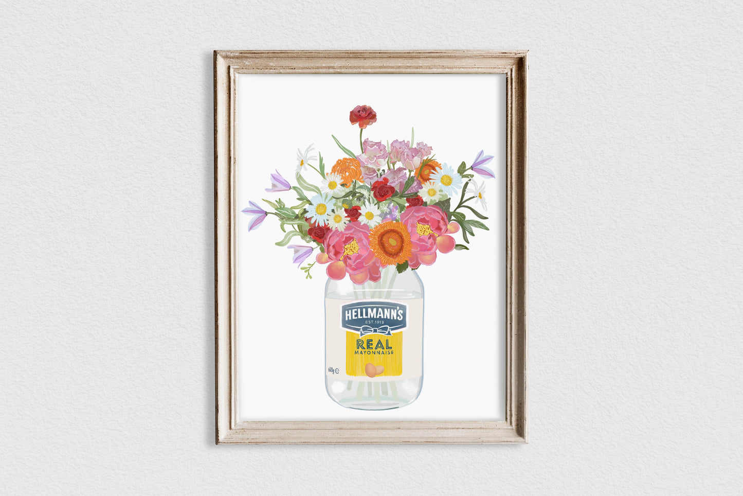 Framed artwork of a jar with flowers and Heinz logo on a white wall