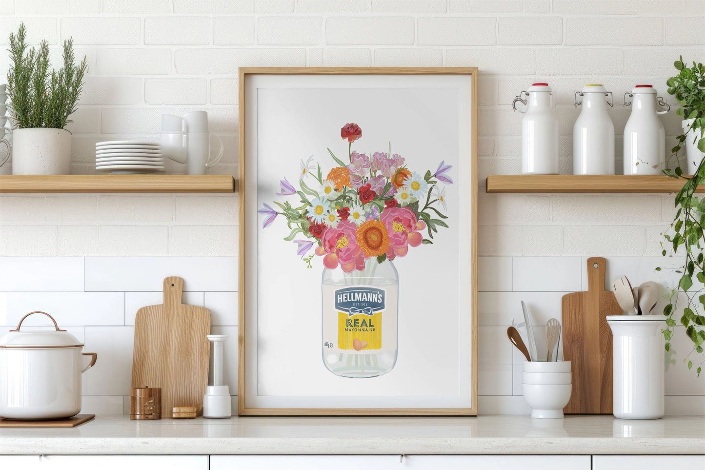 Framed artwork of an empty hellmans mayo jar with colourful flowers on a kitchen counter